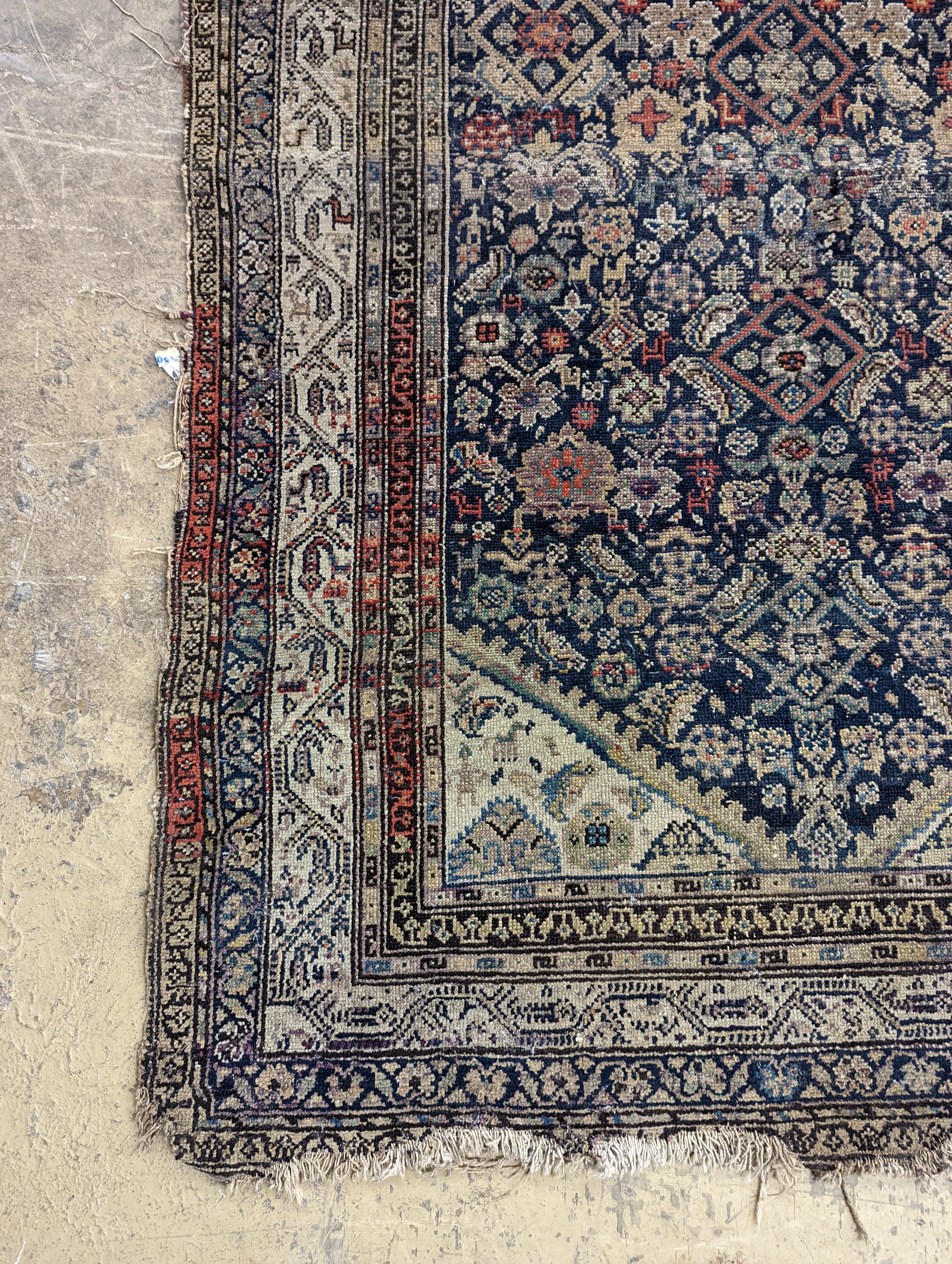 A North West Persian blue ground rug, 190 x 127cm